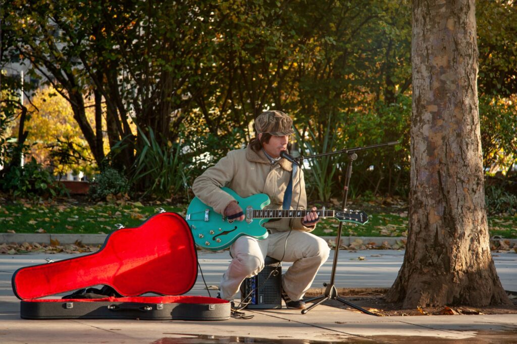 A busker performing in the park.