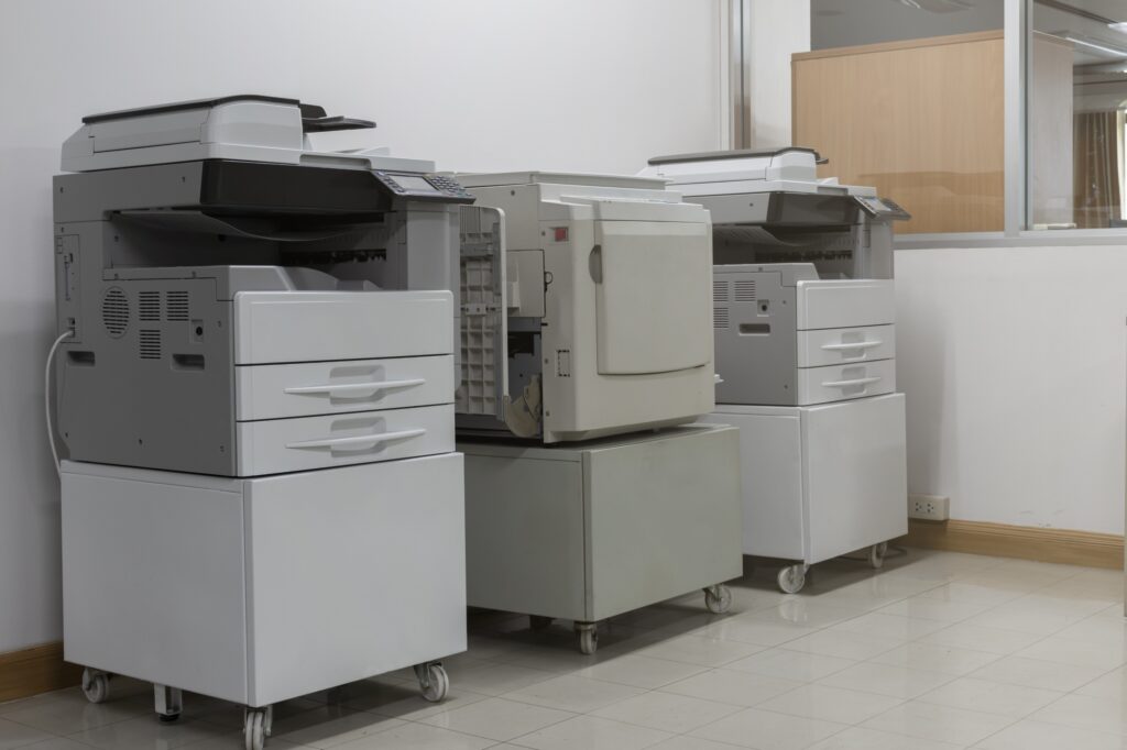 Copy machines at the corner of the office